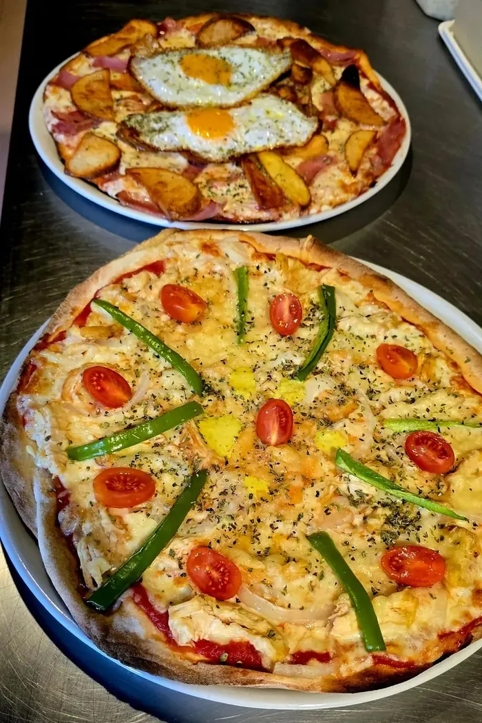 Dues pizzes de la casa